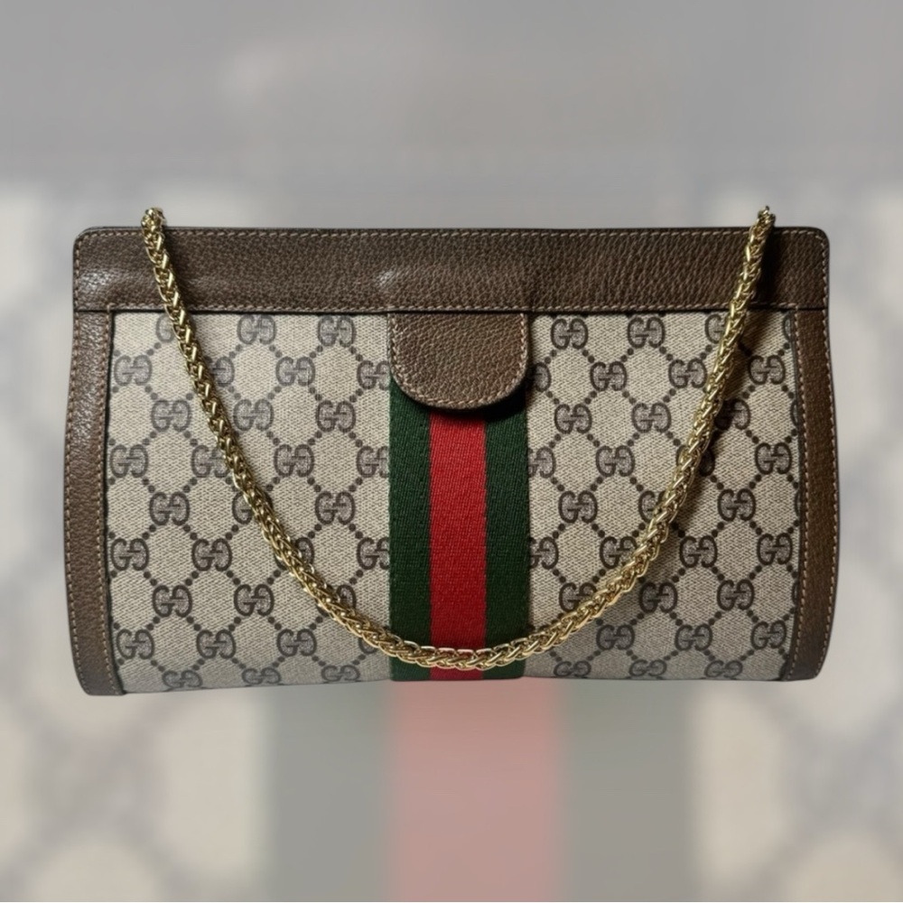 Gucci Ophidia Supreme GG Monogram Supreme Clutch/ Crossbody bag.